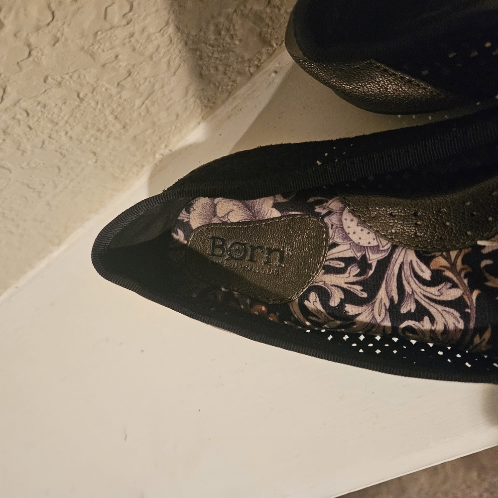 Brown and black Born flats